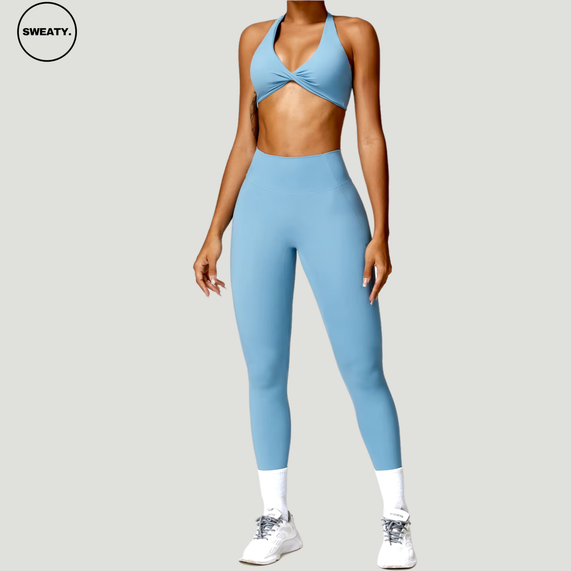 Side view of Blue Nude Feeling Yoga Set by SWEATY – Women’s seamless activewear with a supportive halter-neck top and high-waist leggings. Designed for yoga, fitness, and everyday comfort.