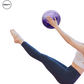 Woman performing a Pilates exercise using a 25cm purple Pilates and yoga ball for core strength, balance, and flexibility training from SWEATY.