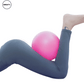 Person performing a leg workout using a pink Pilates yoga ball from SWEATY, focusing on core and lower body strength.